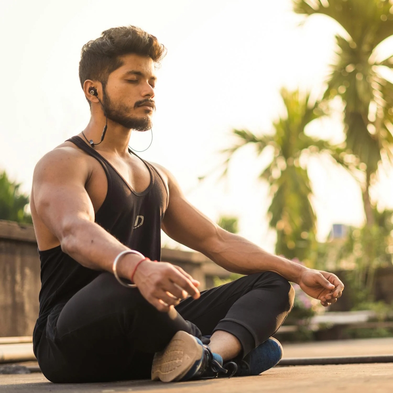 Man meditating for stress relief and better sexual performance