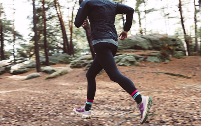 Healthy man running trail representing stamina and vitality